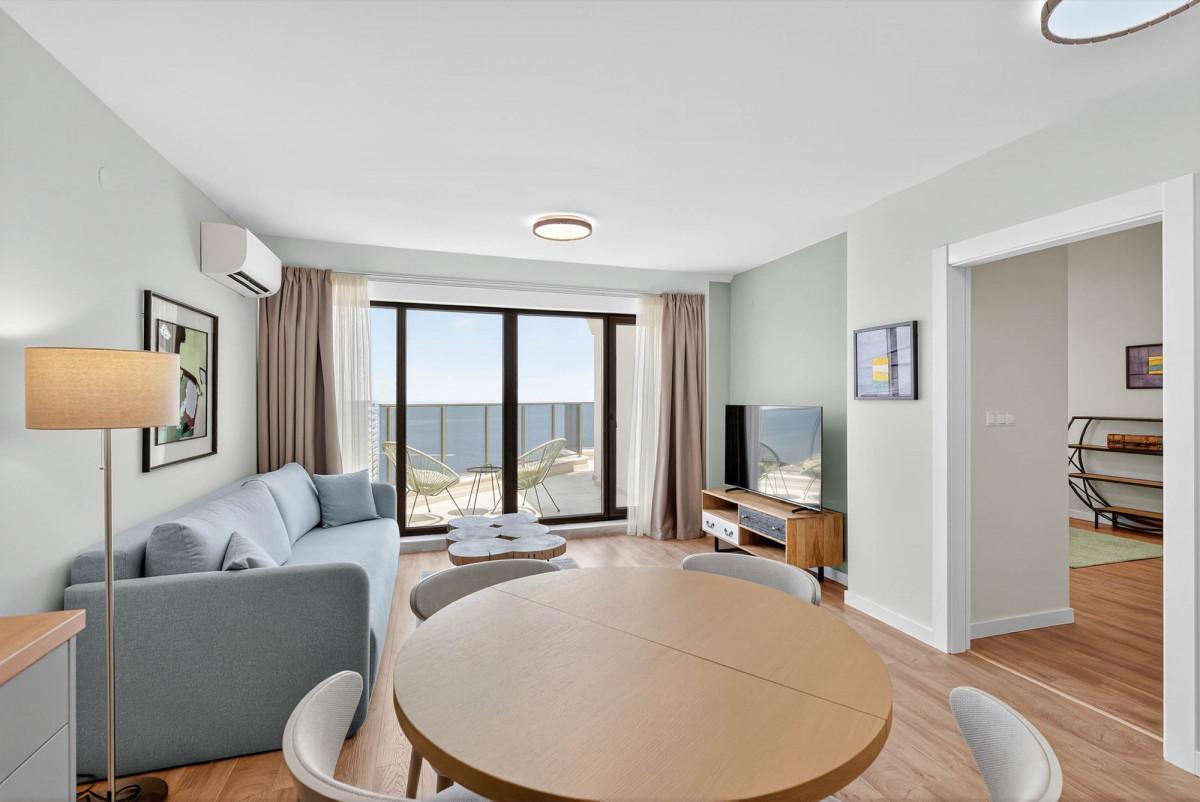 05-after-living-dining-seaview.DBduDHNn